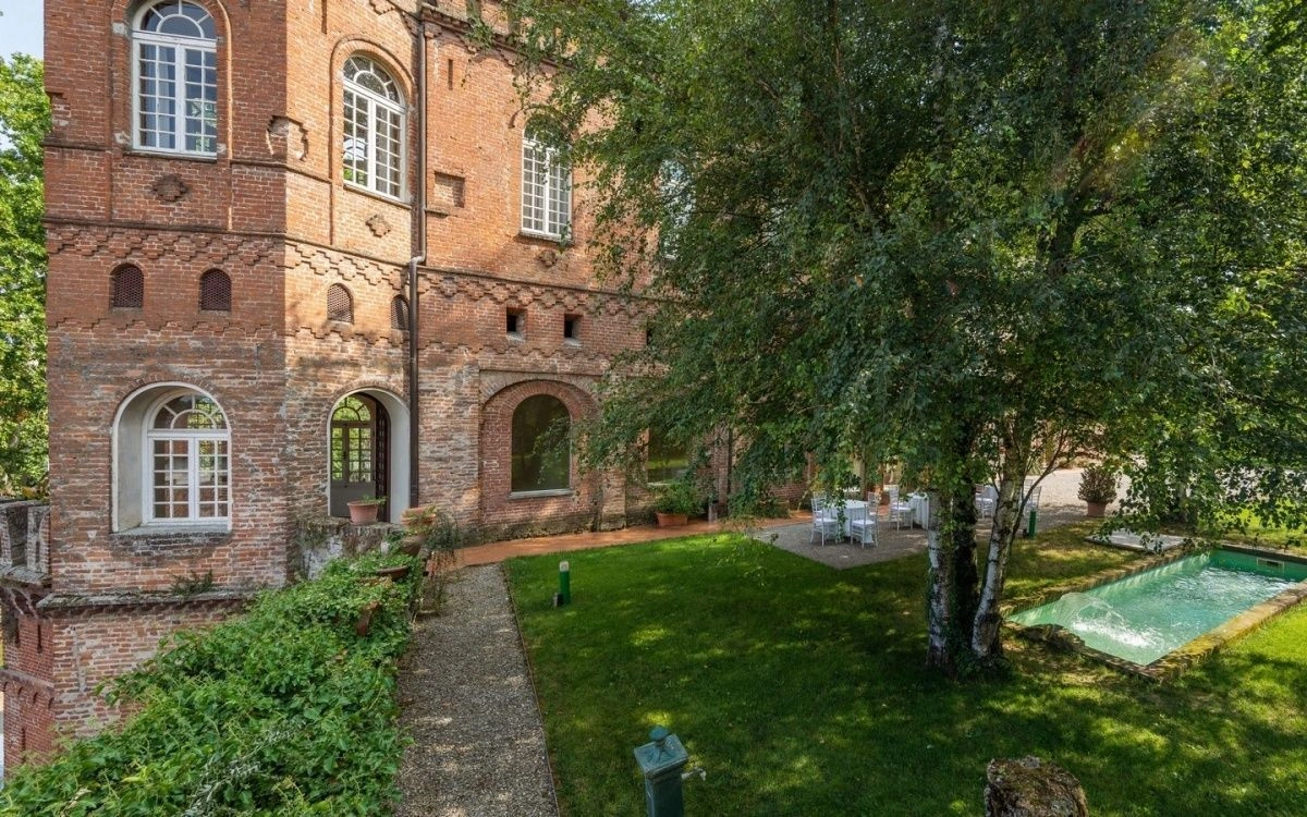 Castle in Alessandria in a medieval settlement in the hills, Italy
