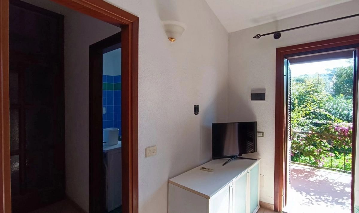 Villa in San Teodoro overlooking the green hills and the coast, Italy