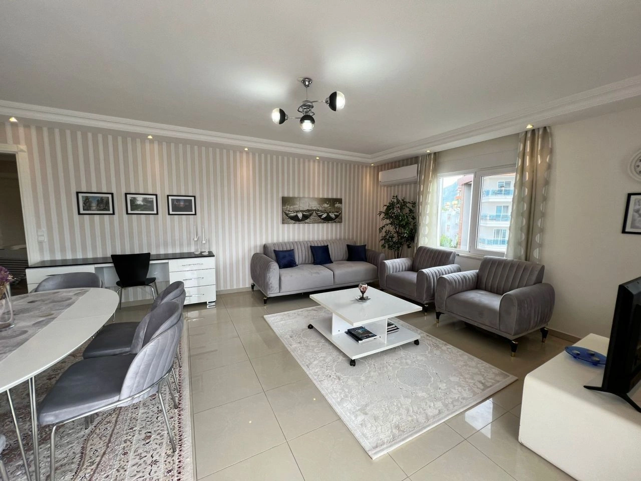 Великолепная квартира площадью 135 м2 с видом на горы и море, в районе Тосмур, Аланья