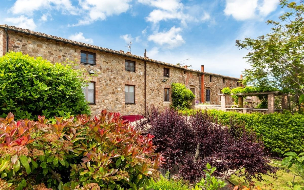 Villa in a suburb of Siena in a historic stone building, Italy