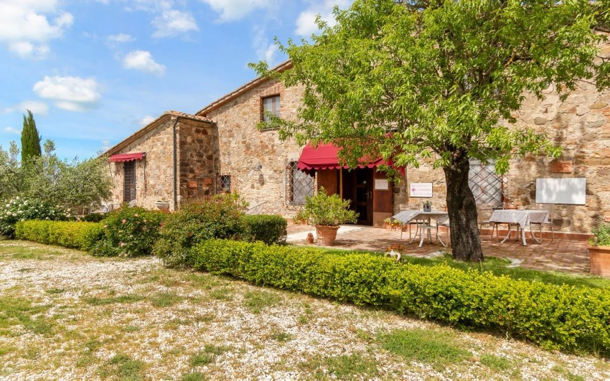 Villa in a suburb of Siena in a historic stone building, Italy