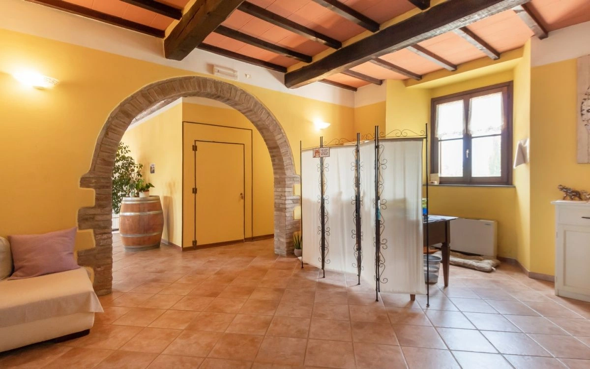 Villa in a suburb of Siena in a historic stone building, Italy