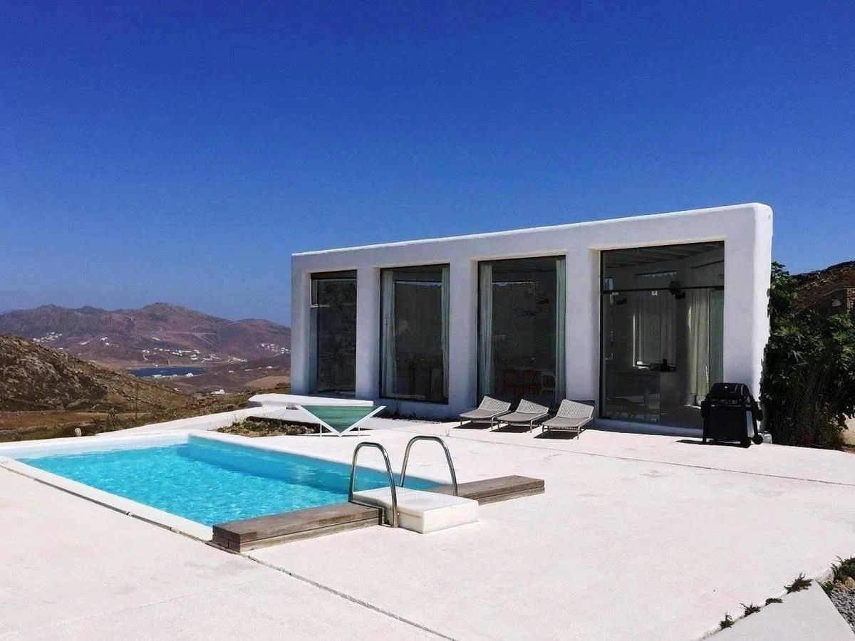 Новая вилла 6+1 с видом на море и поселок на острове Миконос