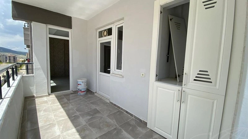 Современная квартира площадью 120 м2 с двумя балконами в Газьянтепе, Турция