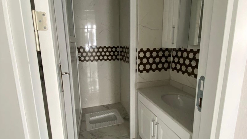 Современная квартира площадью 120 м2 с двумя балконами в Газьянтепе, Турция